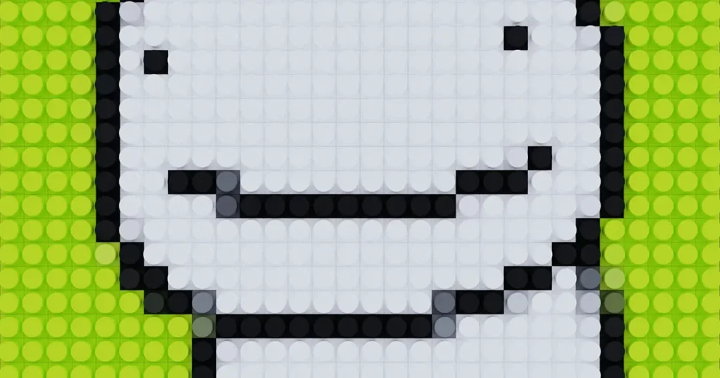 Pixelated smiling face design created with LEGO-style circular blocks in black, white, and green. The minimalist face features two small eyes and a curved mouth, set against a bright green background.